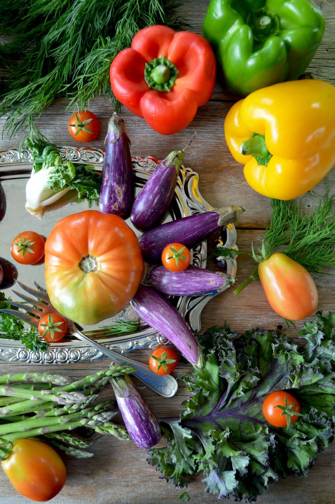 fresh-spring-recipes-using-seasonal-vegetables Assortment of fresh seasonal spring vegetables including tomatoes and eggplants