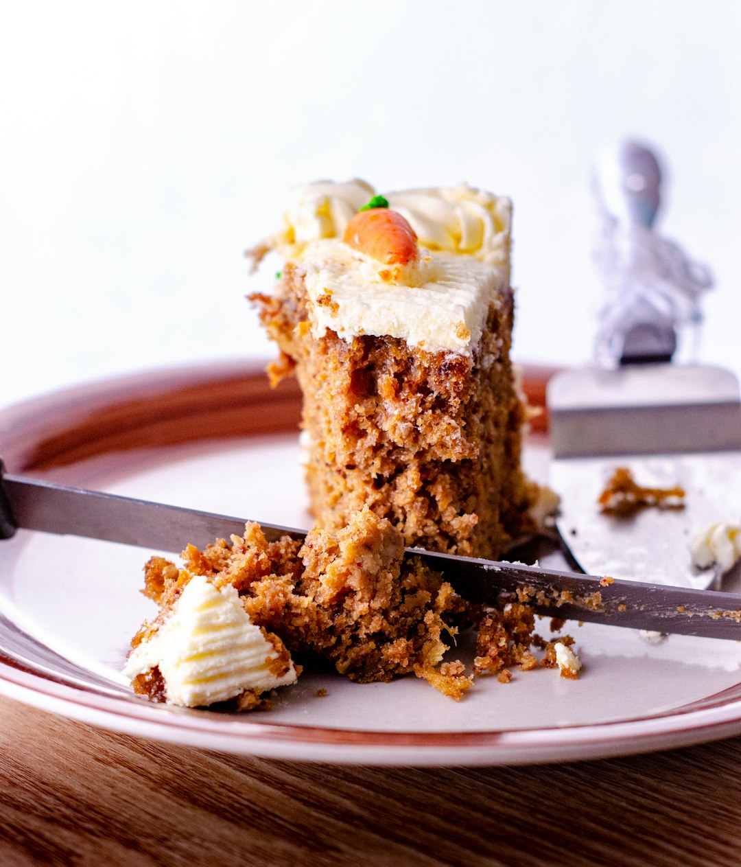carrot-cake-with-cream-cheese A slice of homemade carrot cake topped with thick white cream cheese frosting