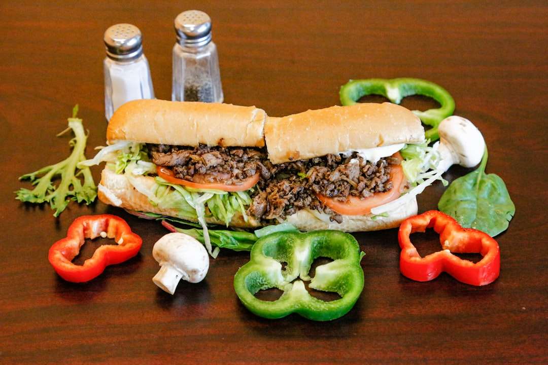 classic-philly-cheesesteak Loaded traditional Philly cheesesteak sandwich with sautéed beef, bell peppers, and cheese